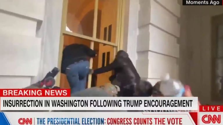 WATCH: Trump Supporters Break Into U.S. Capitol Using Blunt Force