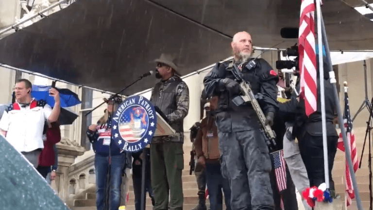 Armed protesters without PPE storm Michigan's Capitol building